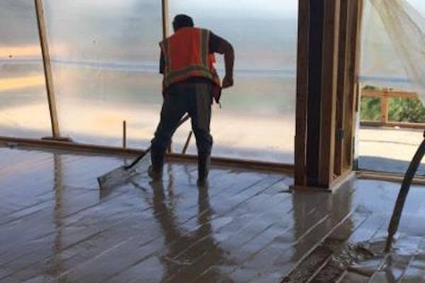 Gypsum Flooring For Radiant Heat Gypsum being installed over radiant heating